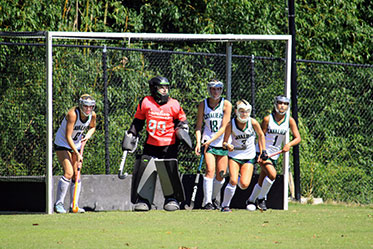 Students playing field hockey. Links to Gifts of Appreciated Securities Students playing field hockey. Links to Gifts of Appreciated Securities