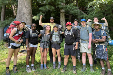 Students posing for the camera after a long hike. Links to Gifts from Retirement Plans Students posing for the camera after a long hike. Links to Gifts from Retirement Plans
