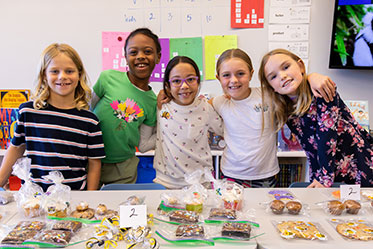 A group of girls working a bakesale together. Links to Gifts of Cash, Checks, and Credit Cards A group of girls working a bakesale together. Links to Gifts of Cash, Checks, and Credit Cards